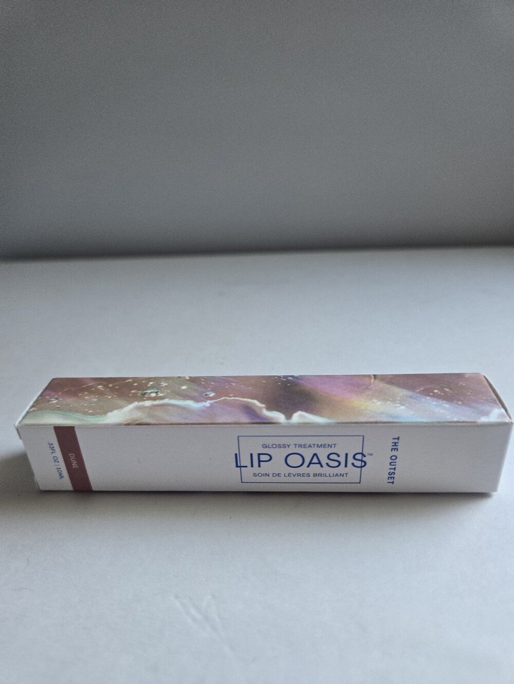 The OUTSET Lip Oasis Glossy Treatment color Dune